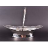 A George III silver swing-handled cake basket London 1799, by William Abdy, of oval form with
