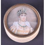 A 19th century portrait miniature painted on ivory set into an ivory box depicting a young