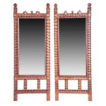 A pair of late 19th century Tramp Art mirrors with facetted diamond decoration and central