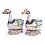 A pair of Chinese cloisonné pots in the form of ducks polychrome decorated, with gilt metal beaks,
