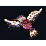 A yellow gold, diamond, opal, ruby, and sapphire hummingbird brooch the head inset with a ruby eye