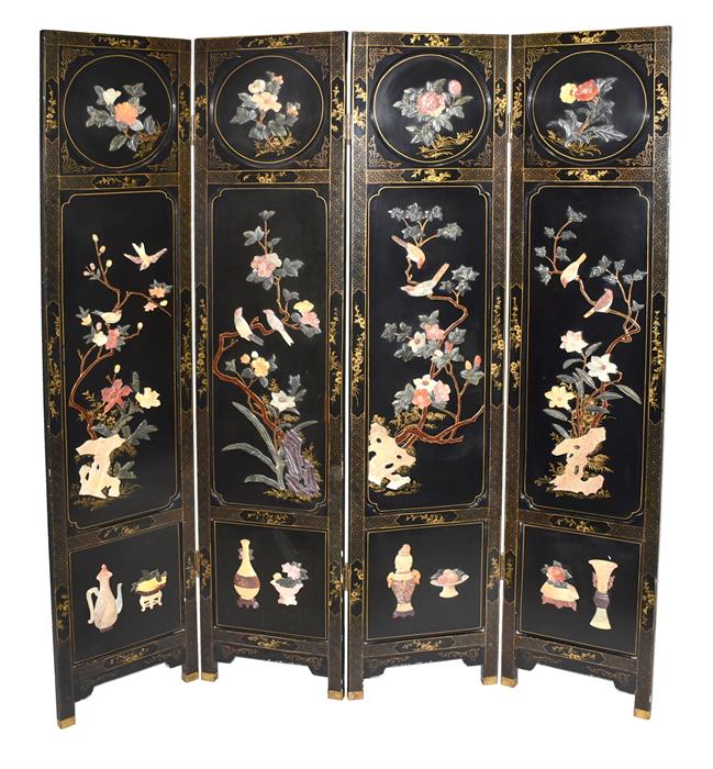 A 20th century Japanese lacquered four-sectional screen or room divider the black ground decorated