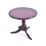 A 19th century mahogany miniature snap top tripod table above a birdcage movement, diameter 30 cm,