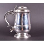 A George III silver lidded tankard London 1764, by William Shaw & William Priest, the domed lid with