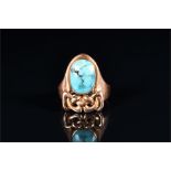 A Liberty & Co. 15ct yellow gold and turquoise ring of Celtic knotted design, set with an oval