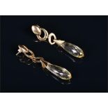 A pair of 9ct yellow gold and lemon quartz drop earrings each with a long tapered quartz drop,