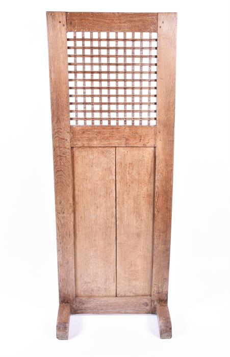 A pale oak Arts & Crafts dressing screen with lattice work panel. 149.5 cm high.