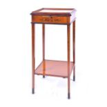 An Edwardian Sheraton Revival painted satinwood stand painted all over with flowers, the top with