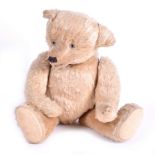 A 1920s golden growling teddy bear designed by John Kirkby Farnell growler contained in body, with