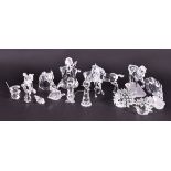 A quantity of Swarovski animals to include a group of two horses, a single horse, a rearing horse (