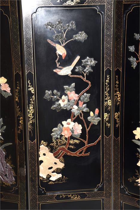 A 20th century Japanese lacquered four-sectional screen or room divider the black ground decorated - Image 3 of 6