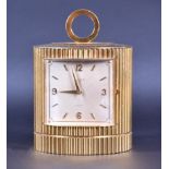 A good quality 20th century combined cylinder mantle clock storage jar the gold coloured fluted drum