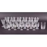 An assorted selection of Waterford crystal cut glasses of varying sizes largest 14 cm high. (24)