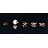 A 9ct yellow gold and ruby ring the shoulders set with diamond accents, size O, together with a