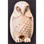 A late 19th / early 20th century Ivory carving of a standing owl stylistically presented with