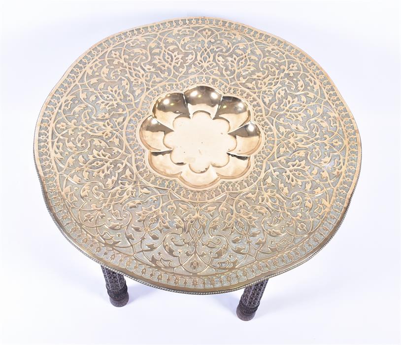 A 20th century Benares brass tray topped table the shaped circular top with scrolling foliate - Image 2 of 3