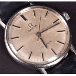 A 1969 Omega stainless steel mechanical wristwatch the silvered dial with baton hour markers and
