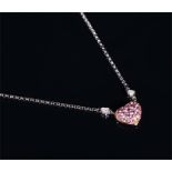 An 18ct white gold, diamond, and pink sapphire necklace the heart-shaped pendant set with round