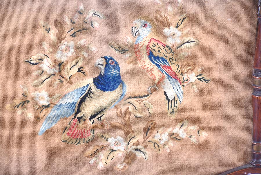 A William IV Regency pole screen the needlework panel embroidered with a scene of parrots, with - Image 7 of 8
