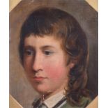 A 19th century portrait of a young boy in semi-profile oil on canvas, in a scalloped gilt gesso