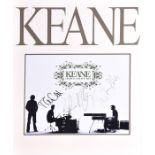 A signed Keane print from their album 'Hopes and Fears' framed and glazed, 30 x 38.5 cm.