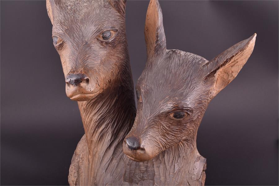 An early 20th century Black Forest carving of a stag and doe the heads carved from one piece of wood - Image 2 of 6