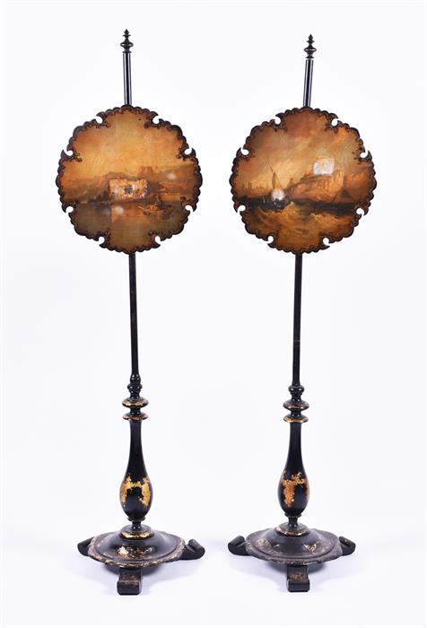 A pair of Victorian papier-mâché painted pole screens painted with scenes of Isola Legghi, Lago di