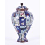 A late 19th century Chinese cloisonne enamelled lidded vase of baluster form, decorated with