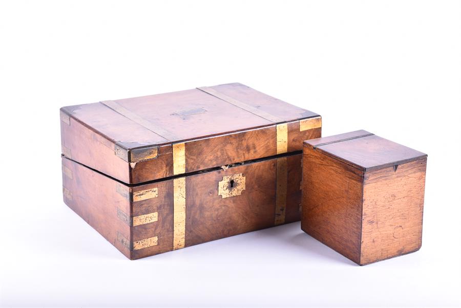 A Victorian writing box with brass bound inlay the interior with gilt and tooled leather, split into