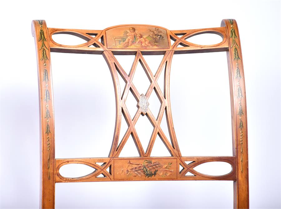 A set of four 19th century Sheraton Revival satinwood chairs each with cane seats and finely painted - Image 3 of 14