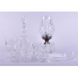 A collection of Waterford glass to include a two part crystal glass lamp, a set of three small