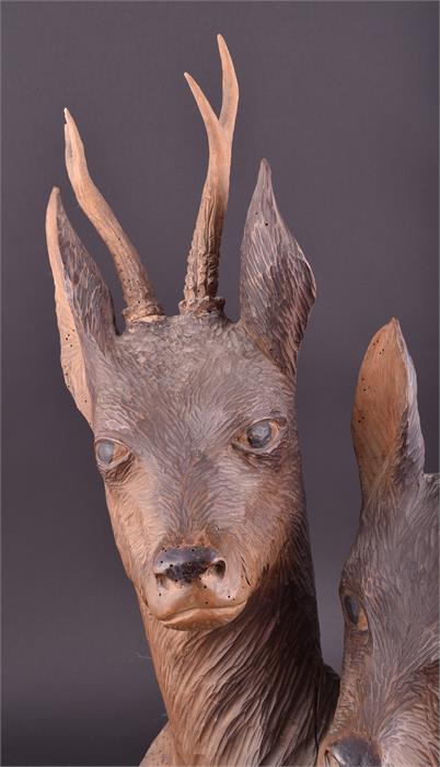 An early 20th century Black Forest carving of a stag and doe the heads carved from one piece of wood - Image 3 of 6