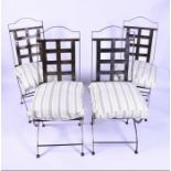 A set of six designer cut steel patio or conservatory dining chairs two with arms, with lattice-work