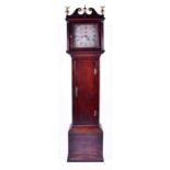 An 18th century oak long case clock the silvered dial with silvered chapter ring, engraved