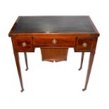 A small Edwardian mahogany card table with a folding green felt lined interior and inset leather