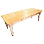 A large pine farmhouse refectory / dining room table with a single frieze drawer and supported