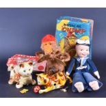 A collection of four vintage toys to include a boxed Rock Valley 'Musical Chimp' two small clockwork