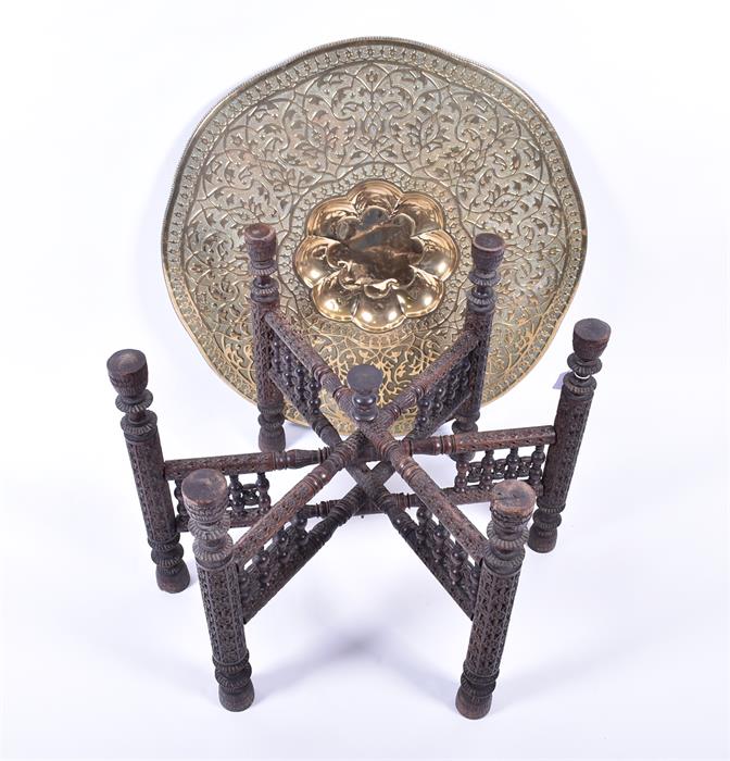 A 20th century Benares brass tray topped table the shaped circular top with scrolling foliate - Image 3 of 3