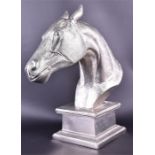 A large decorative chromium horse bust realistically modelled, raised on a square plinth base, 55 cm