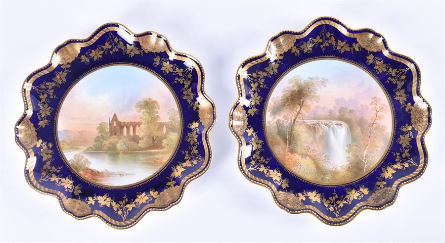 A pair of Aynsley painted porcelain plates 'Minnehaha Falls' and 'Bolton Abbey', painted with