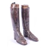 A pair of late 19th / early 20th century brown leather riding boots with triple wooden trees, 48