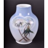 A small Royal Copenhagen vase decorated with dandelions, on a pale blue ground. Marked and number