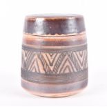 An early Mary Rich studio pottery covered jar the brown and beige glazed jar with central band of