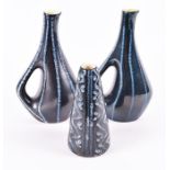 Two 1960s Hungarian Tófej Ceramic (Tófej Kéramiaüzem) jug vases of curving form with integral