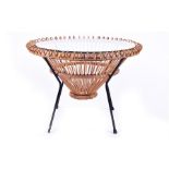 A 1950s Italian Franco Albini cane and wicker table of 'atomic' inspiration, with a conical cane and