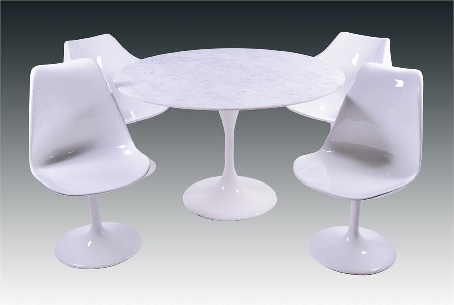 A mid to late 20th century Knoll 'Tulip' table and four 'Tulip' dining chairs designed by Eero