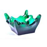 A 1930s or 1950s Murano 'A Bollicine' green glass bowl by or in the manner of Carlo Scarpa for