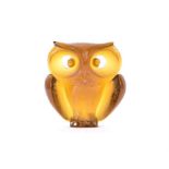 A 1970s Czech Majak Jablonec yellow cast glass owl sculpture designed by Professor Jan Cerny, with