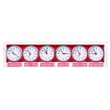 A 1950s-60s Metamec 'world clock' comprising six plastic cased electric clocks set in a handmade