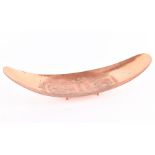 A mid-20th century handmade copper display dish probably Mexican or South American, of curving,